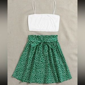 Super cute 2 piece set. Size large, Never worn! A belt to tighten skirt